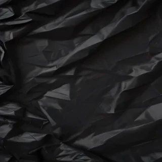 black crumpled paper