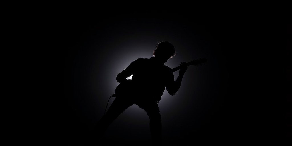 Create a high-resolution silhouette of a guitarist playing passionately, with a black background, using a DSLR camera, aperture f/2.8, ISO 100, 50mm lens, shot from a low angle to accentuate the figure's shape and dynamic pose.