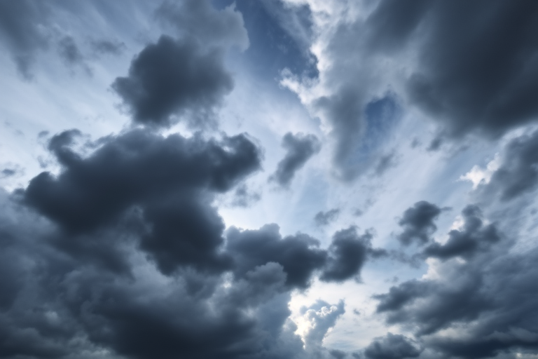 Capture a dramatic sky filled with dark, swirling clouds using a DSLR camera, 24mm lens, f/8 aperture, ISO 100, 1/125 sec shutter speed, wide-angle view, and high dynamic range settings to enhance image quality and detail.
