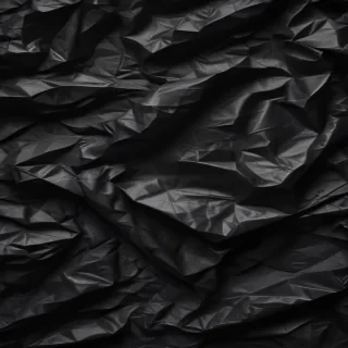 black crumpled paper