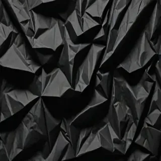 black crumpled paper
