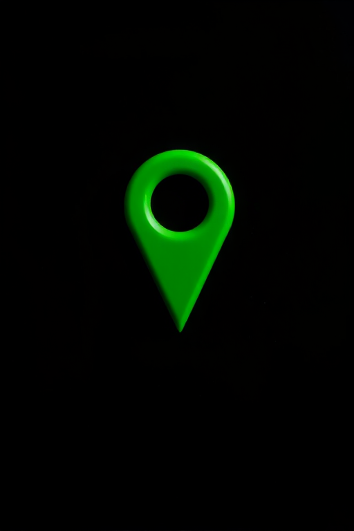 Create a high-resolution image of a green location pin on a black background, using a DSLR camera with a 50mm lens, aperture set to f/2.8, ISO 100, and at an eye-level view.