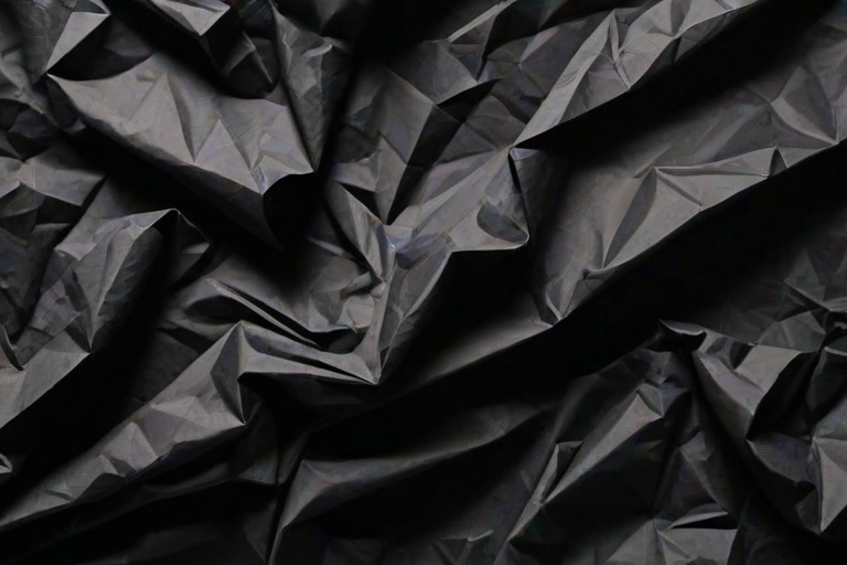 crumpled black paper