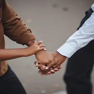 black couple holding hands