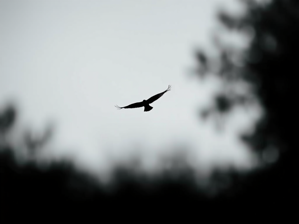 Generate a high-resolution image of a minimalist black silhouette of a bird in flight, captured with a DSLR camera at f/2.8 aperture, ISO 100, 1/1000 shutter speed, shot from a low angle with a cinematic style to enhance clarity and impact.
