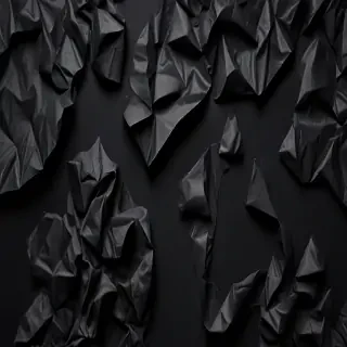 crumpled black paper