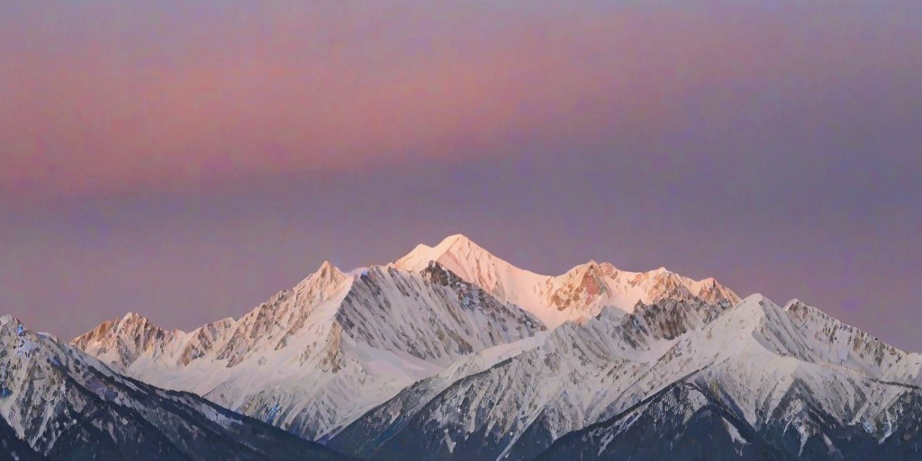 Sharp, high-resolution photo of a snow-capped mountain range at sunrise, soft pinks and oranges painting the sky, distant clouds gently rolling over the peaks, and the crisp, cold air of dawn.