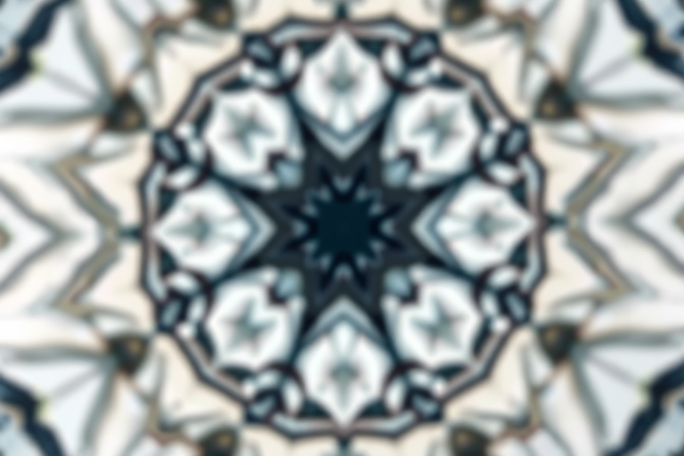 Generate a high-resolution image of an abstract geometric design, using a 50mm lens at f/1.8 aperture, ISO 100, with a shallow depth of field and a soft focus background, captured in a top-down view with a DSLR camera for enhanced clarity and detail.