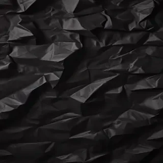 black crumpled paper