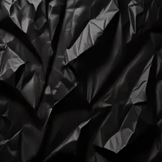 black crumpled paper