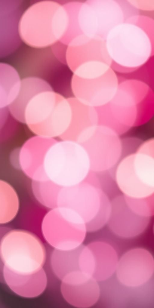 Create an abstract image of colorful blurred circles in shades of pink, purple, and cream with a bokeh effect, captured with a Canon EOS R5, using a 50mm lens at f/1.8, ISO 100, shutter speed 1/200s, in soft focus to enhance depth and richness.