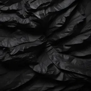 crinkled black paper