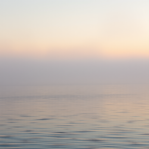 capture a serene misty landscape over a calm body of water with gentle ripples and soft, muted colors at dawn, using a DSLR camera with a 35mm lens, aperture f/8, ISO 100, shutter speed 1/60s, and a wide-angle view to enhance depth and clarity