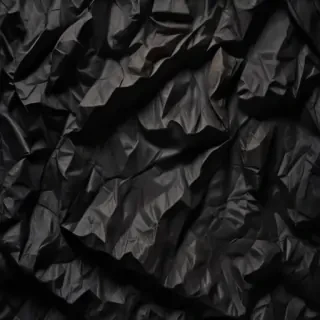 black crumpled paper