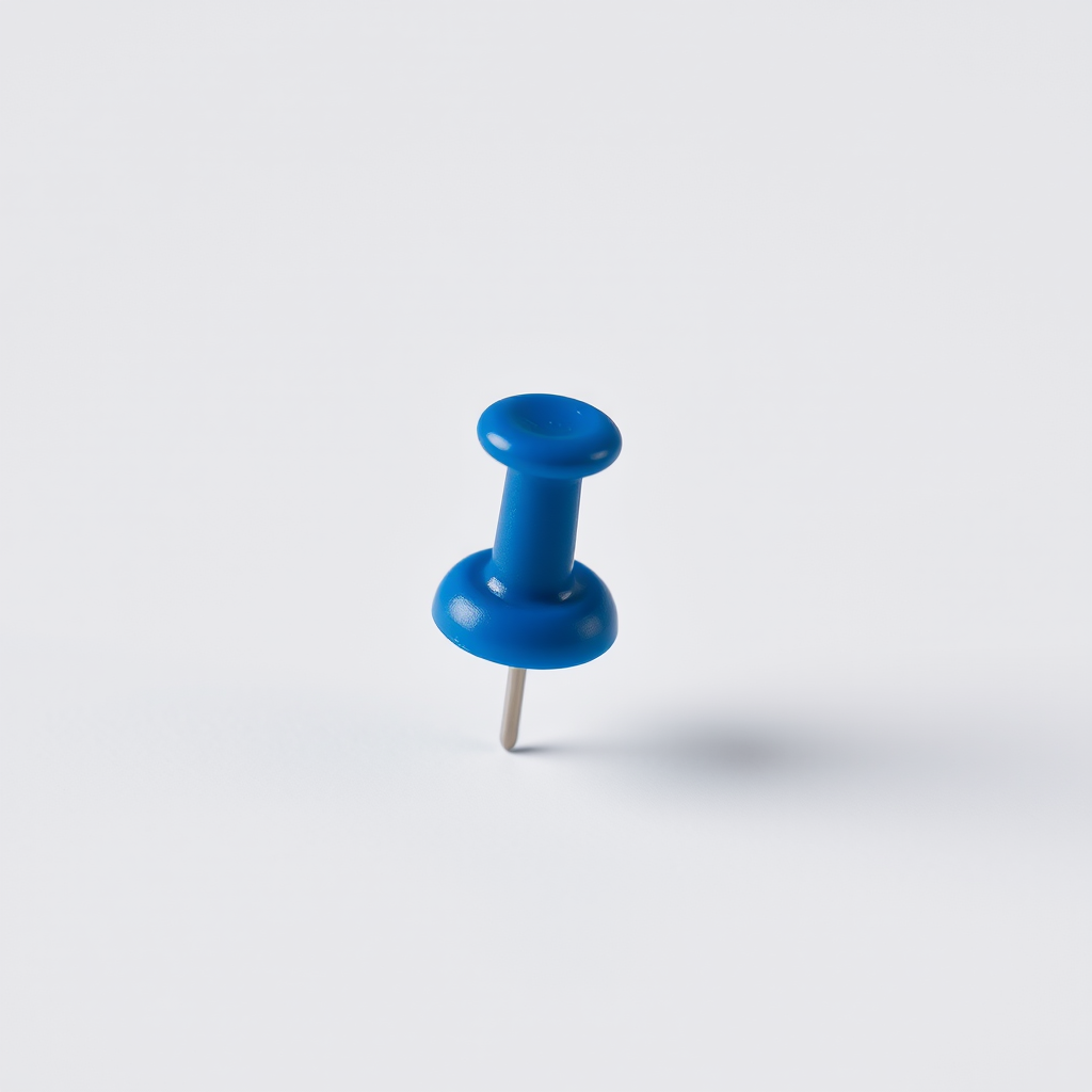 Create a high-resolution image of a blue push pin on a white background, using a DSLR camera with a 50mm lens, aperture f/2.8, ISO 100, and a shallow depth of field to enhance the detail and clarity.