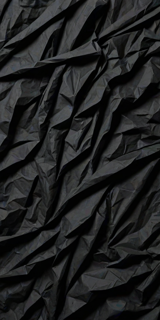crinkled black paper