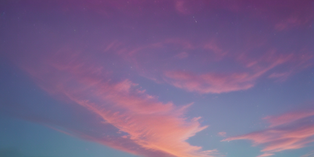A Stunning Evening Sky with Vibrant Pink and Purple Clouds Above.