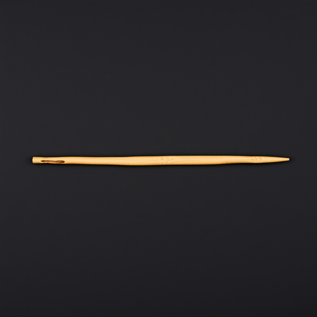a simple brown wooden stick lying horizontally on a black background