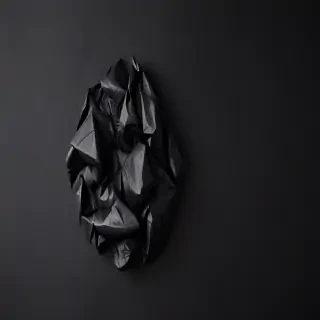 crumpled black paper