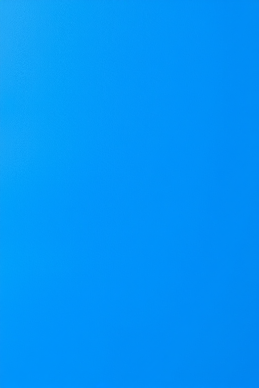 Create a vibrant solid blue texture background, using a Canon EOS 5D Mark IV, ISO 100, f/8 aperture, 1/125 sec shutter speed, 50mm lens, shot from a straight-on view, in bright natural lighting.