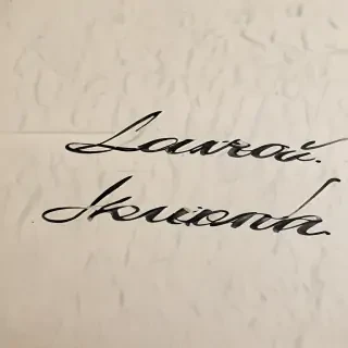 laura in cursive