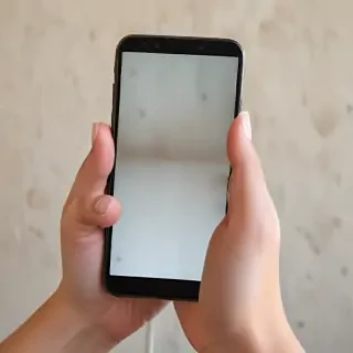 hand holding a phone