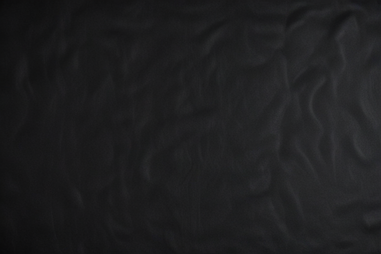 Textured Black Surface with Subtle Waves and Shadows Creating Depth.