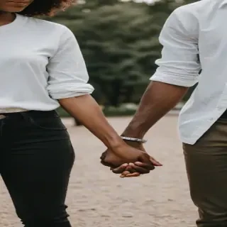 black couple holding hands