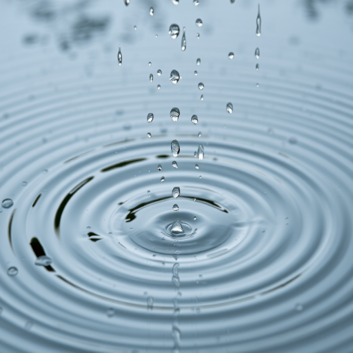 capture a close-up image of rain falling on water, highlighting the concentric ripples, using a DSLR camera with a 50mm lens, aperture f/2.8, shutter speed 1/125s, ISO 100, in natural daylight, with a shallow depth of field for a blurred background effect