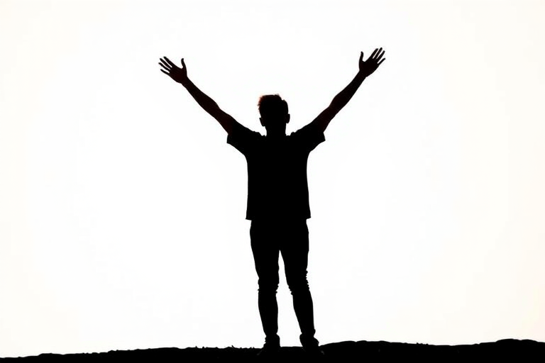 Create a silhouette of a person standing with arms raised in a celebratory pose, against a simple background.