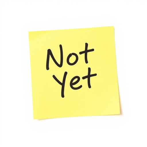 Generate an image of a bright yellow sticky note with the handwritten text "Not Yet" in bold black letters, using a Canon EOS 5D Mark IV camera, 50mm lens, f/2.8 aperture, ISO 100, natural light, and a clean white background for high contrast.