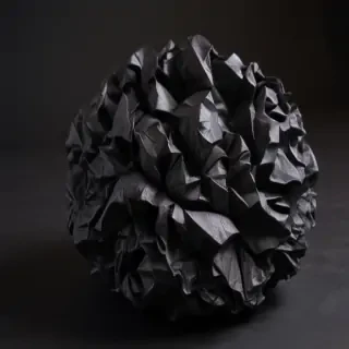 black crumpled paper