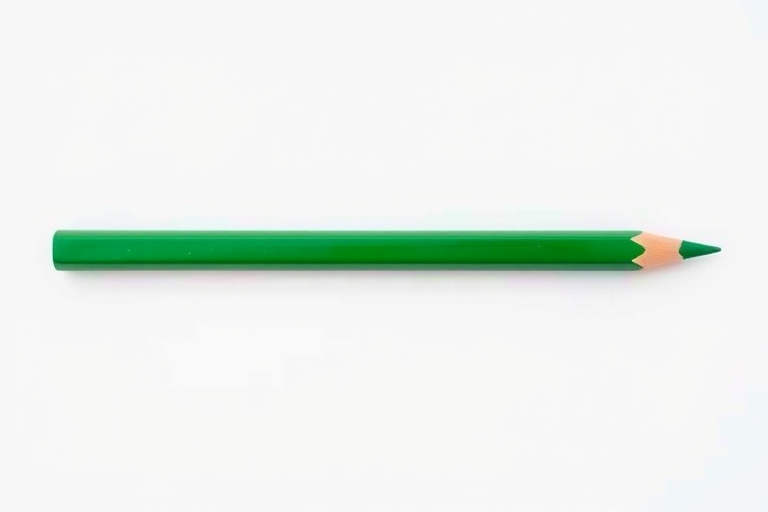 Generate a high-resolution image of a green pencil lying horizontally on a plain white background, using a DSLR camera with a 50mm lens, aperture set to f/2.8, ISO 100, and a soft focus effect to enhance details.