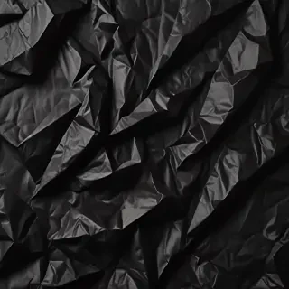 black crumpled paper