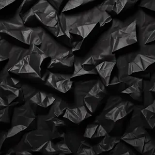 crumpled black paper