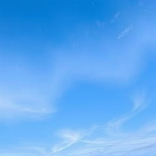 Capture a serene abstract sky with smooth blue gradients, using a DSLR camera at f/8, shutter speed 1/125s, ISO 100, with a wide-angle lens from a high vantage point, in natural light to enhance color vibrancy and texture.