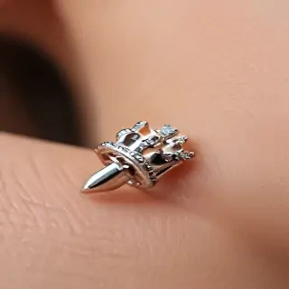 kings crown piercing