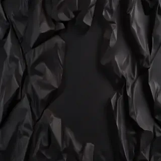 crumpled black paper