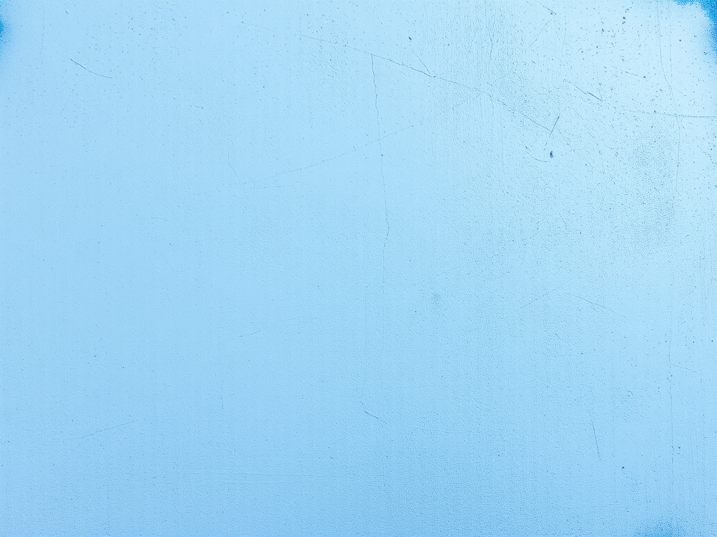Create a high-resolution image of a textured light blue concrete wall with a soft blue paint splash effect around the edges, captured with a DSLR camera using a 50mm lens, aperture set to f/2.8, ISO 100, in natural daylight, focused from a straight-on view to emphasize the wall's texture and color vibrancy.