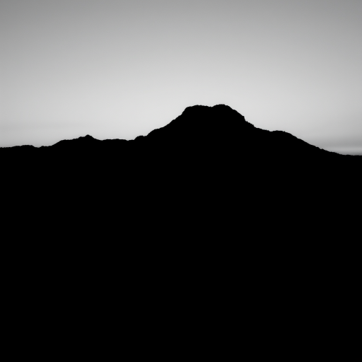 Create a high-resolution monochrome silhouette image of a mountain landscape at sunset, capturing intricate details of the mountain outline and soft gradient in the sky, with a focal length of 35mm, aperture set to f/8 for depth of field, ISO at 100 for clarity, using a DSLR camera at eye level with a wide-angle lens.
