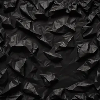 black crumpled paper