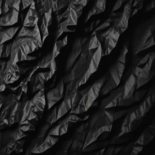 crumpled black paper