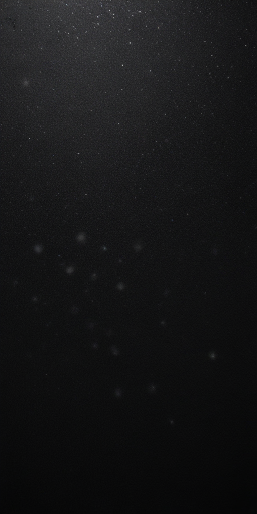 Abstract Dark Background with Subtle Floating Particles in Soft Focus