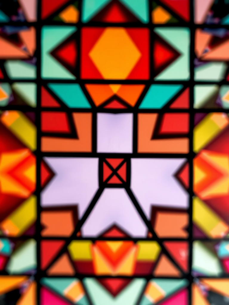 Capture a high-resolution image of an abstract geometric pattern with rich colors and sharp contrasts, using a DSLR camera with a 50mm lens, aperture set to f/1.8, ISO 200, at a shutter speed of 1/125s, focused with a slightly blurred background for depth, ensuring a vibrant and detailed composition.