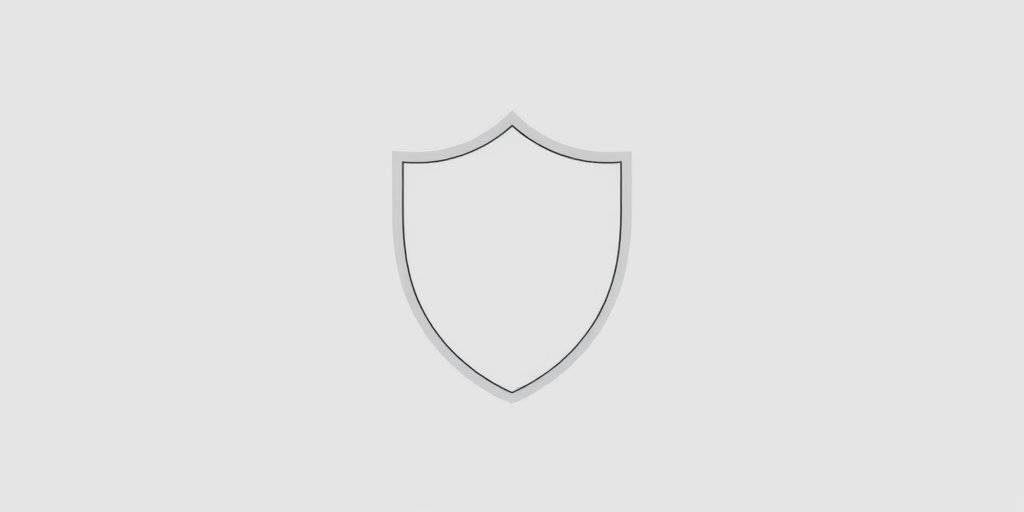 Create a high-resolution image of a blank shield emblem, using a DSLR camera with a 50mm lens, aperture f/2.8, ISO 100, 1/200 shutter speed, taken from a slightly angled front view for depth and clarity.