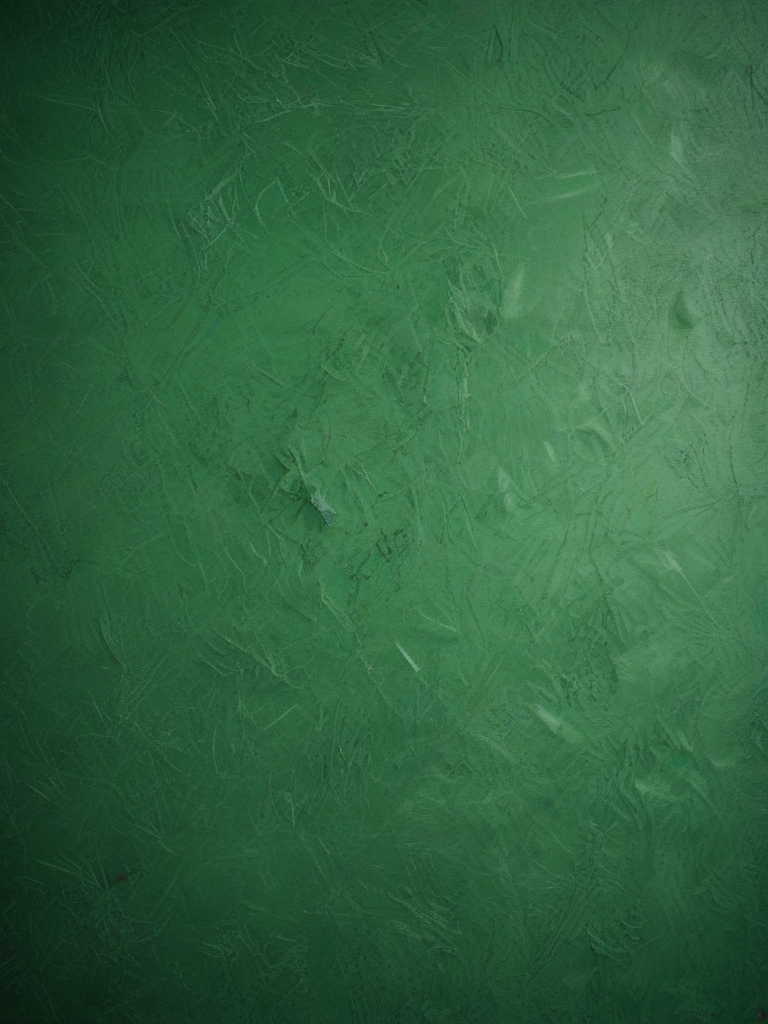 Textured Green Background with Subtle Variations in Shade and Depth