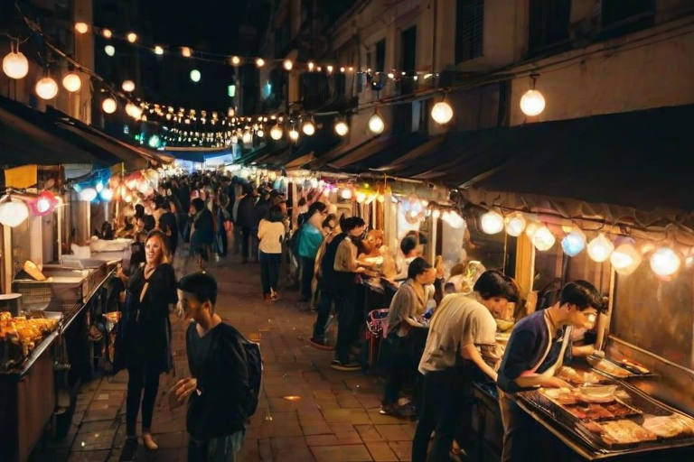 Lively street food market at night, with vendors grilling delicious skewers, colorful lights illuminating the stalls, and people enjoying their meals amidst the lively ambiance.