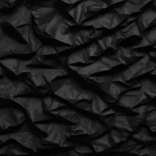 crinkled black paper