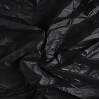 black crumpled paper