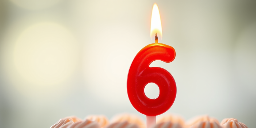 Capture a close-up shot of a red number 6 birthday candle with a soft, blurred background, using a DSLR camera at f/2.8 aperture, ISO 100, 50mm lens, natural lighting, high dynamic range.